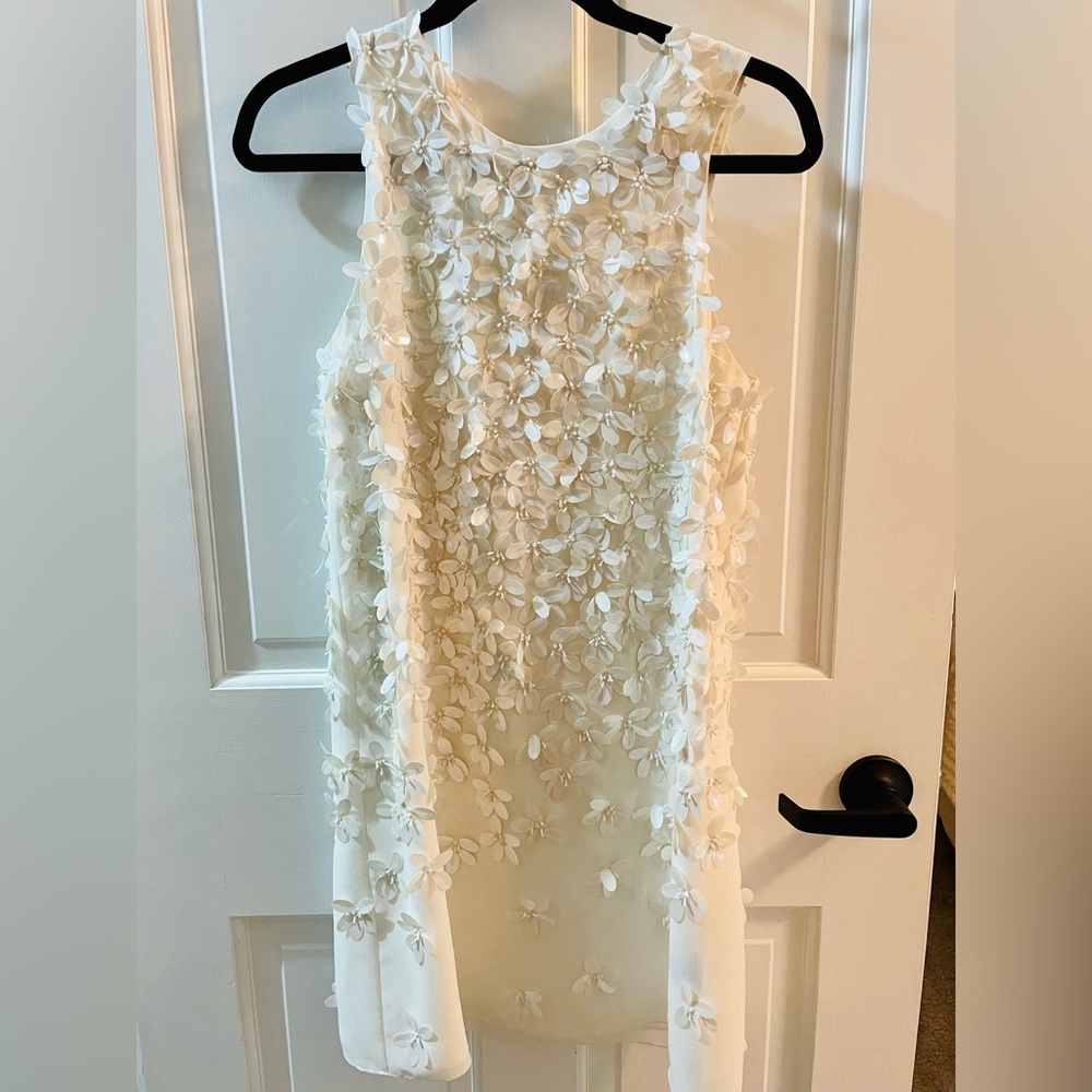 White cocktail dress size 2. Intricate floral details white on white